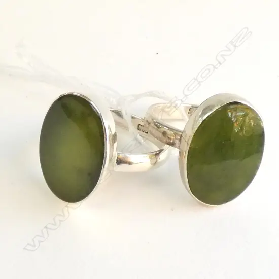 TWO STERLING SILVER POUNAMU RINGS