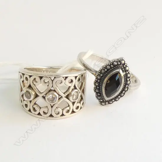 2 SILVER DRESS RINGS