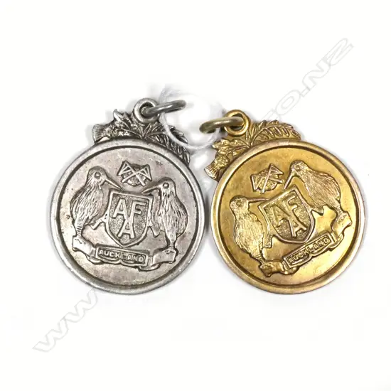 2 'AUCKLAND' FOB MEDALLIONS 1x9CT & 1xSILVER ....