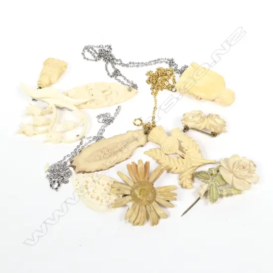 9 CARVED BONE ETC PENDANTS ETC