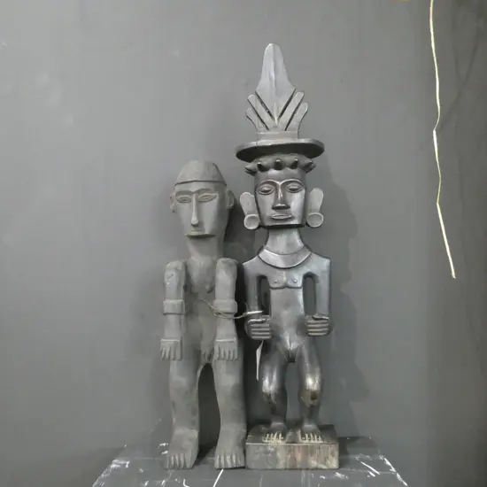 TWO CARVED WOODEN FIGURES NIAS SUMATRA.375MM AND AFRICA ? (AF) 280MM