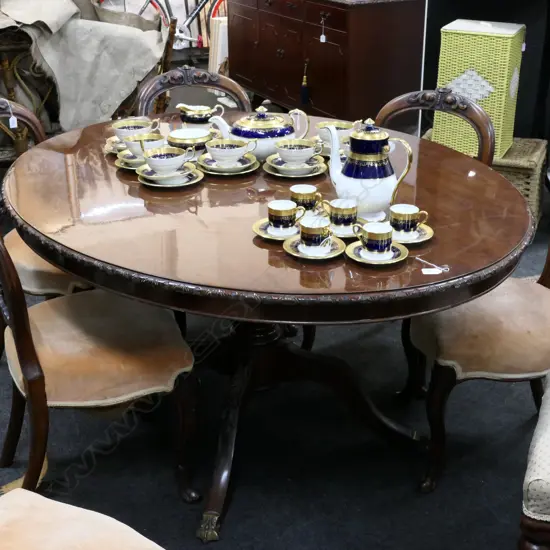 MAHOGANY OVAL PEDESTAL BASED DINING TABLE