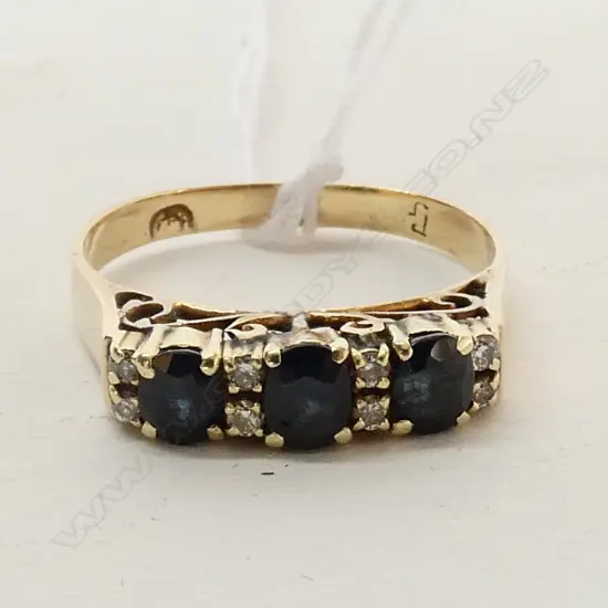 14CT? SAPPHIRE AND DIAMOND BRIDGE RING P SIZE