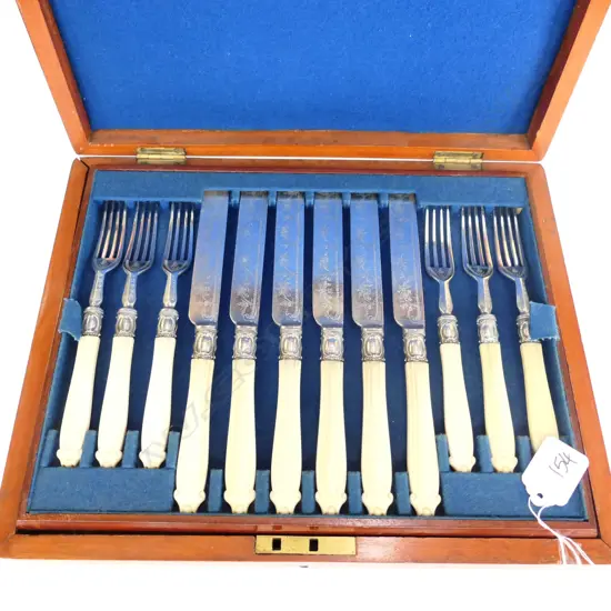 CASED SET 12 IVORY & S/P LUNCHEON SET