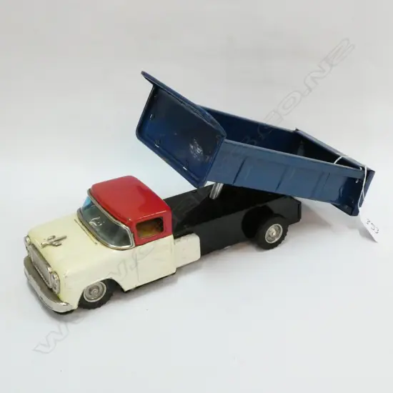 JAPANESE TINPLATE LEVER ACTION TIP TRUCK WORKING CONDITION