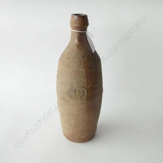 SAN MARINO 1970'S "KUMEU RED DRY" POTTERY BOTTLE BY ADRIAN COTTER