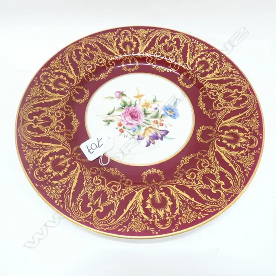 A Royal Worcester circular rack plate