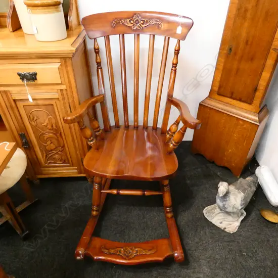 WOODEN CARVED ROCKING CHAIR