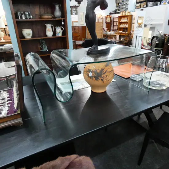 MODERNIST BENT GLASS COFFEE TABLE WITH MAGAZINE RACK W. 600MM D. 1060MM H. 380MM