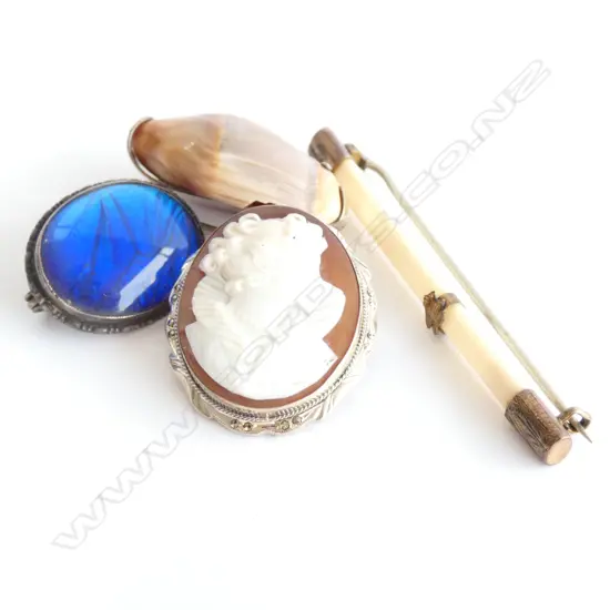 FOUR UNUSUAL BROOCHES 