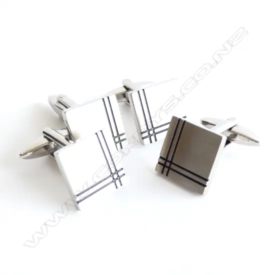 TWO PAIRS OF STEEL CUFFLINKS