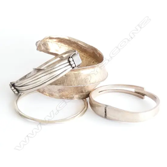 FIVE SILVER BANGLES