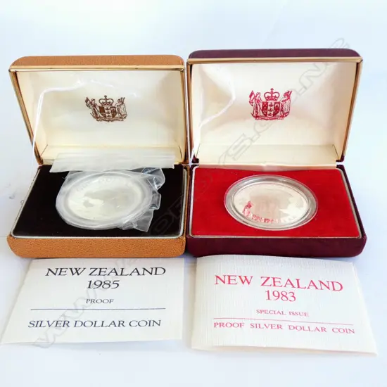 TWO NZ SILVER DOLLARS - BOXED - '85 BLACK STILT/'83 CHARLES & DI