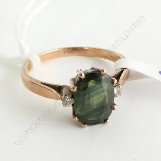9ct Ring lge Green Sapphire/garnet & diamond