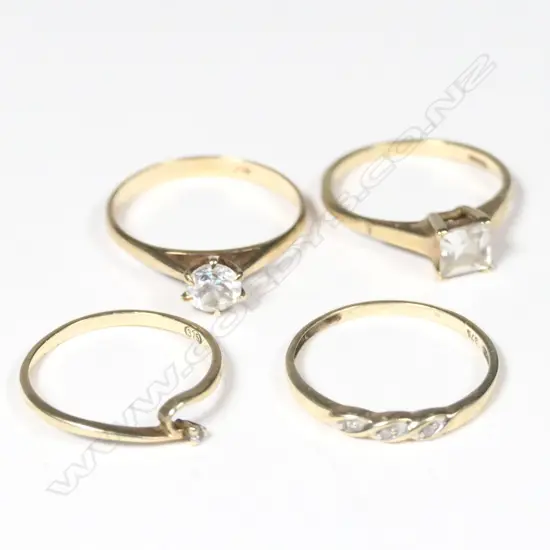 4 9CT RINGS WHITE STONES