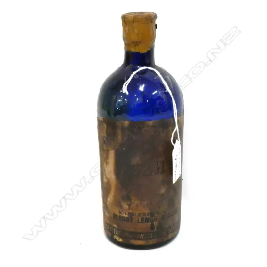 C1900 ORIGINAL LABELED BLUE BOTTLE....