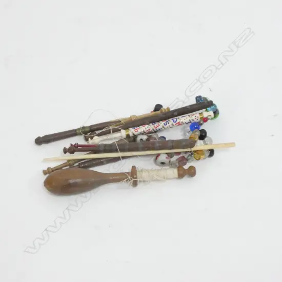 9 ANTIQUE LACE BOBBINS WITH GLASS BEADS ETC