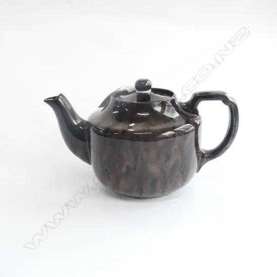 NZ Potteries Ltd.Wellington Teapot. Variable dark glaze