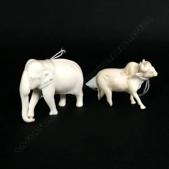 SMALL IVORY ELEPHANT AND BULLOCK (A/F) 