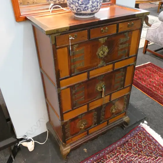 BRASS BOUND ORIENTAL CUPBOARD H 1050MM