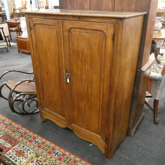 TWO DOOR  CABINET, WITH PANELLED DOORS ENCLOSING SHELVES & 2 SMALL DRAWS 