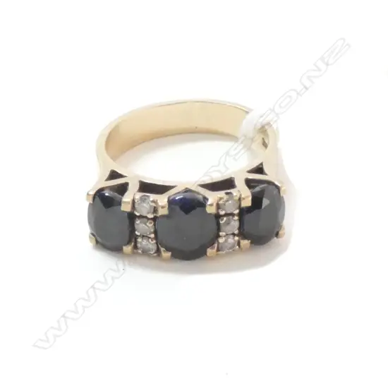 9 CT BLACK SAPPHIRE & CZ RING 6.6 GRAMS