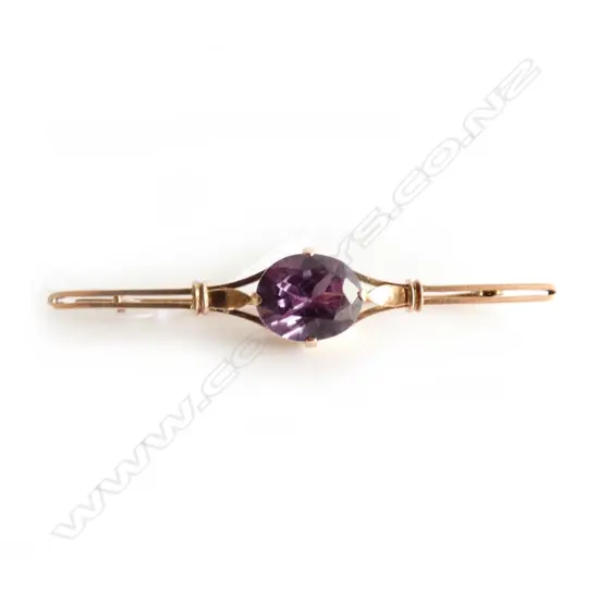 9CT GOLD AND PURPLE STONE BAR BROOCH