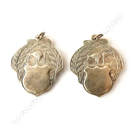 2 VINTAGE SILVER NZ FOB MEDALLIONS 