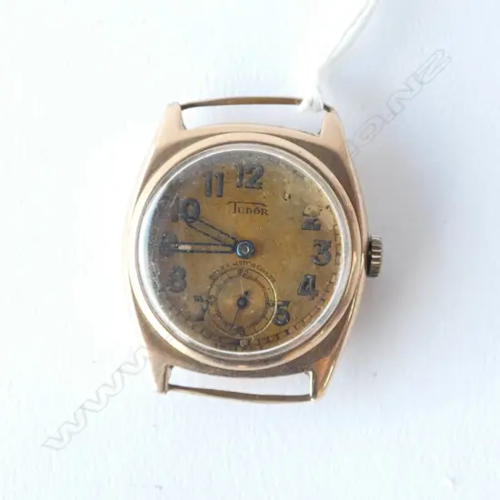 Mens 1930-40's 9ct Gold watch, case by Rolex, movement Tudor, Dial has Rolex Watch Company,