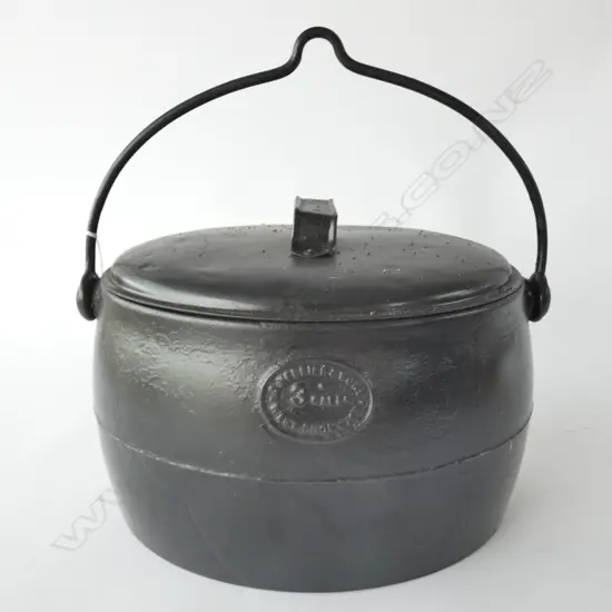 KENRICK CAST IRON OVAL LIDDED POT, W. 360MM