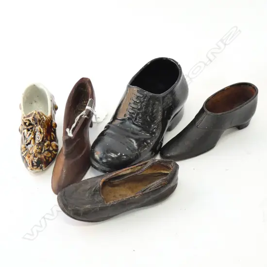 5 OLD SHOE ORNAMENTS: CARVED WOOD. 2 LEATHER...