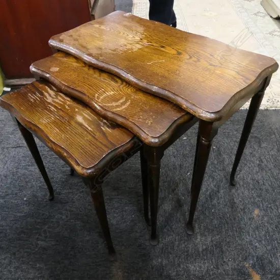 NEST OF 3 OAK SPINDLE LEGGED TABLES....