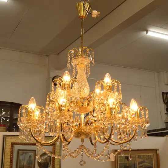 CRYSTAL AND BRASS CHANDELIER - AS NEW