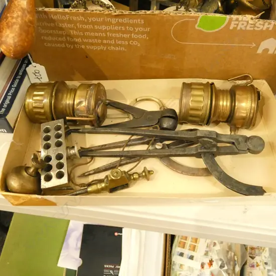 BOX OF BLACKSMITH'S DIVIDERS, BULLET MOULDS, ACETYLENE LAMPS, ETC 
