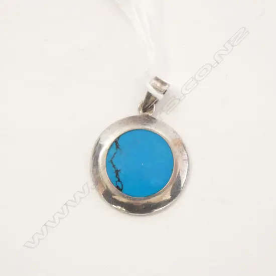 Sterling Silver pendant with blue stone