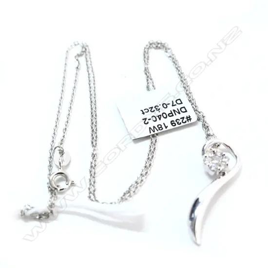 18ct W/GOLD 7 DIAMOND PENDANT SILVER CHAIN. INS. $1320