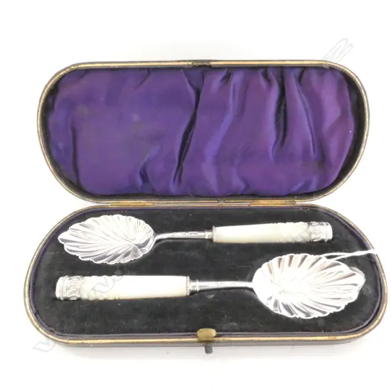 CASED STG SILVER AND M.O.P SPOONS