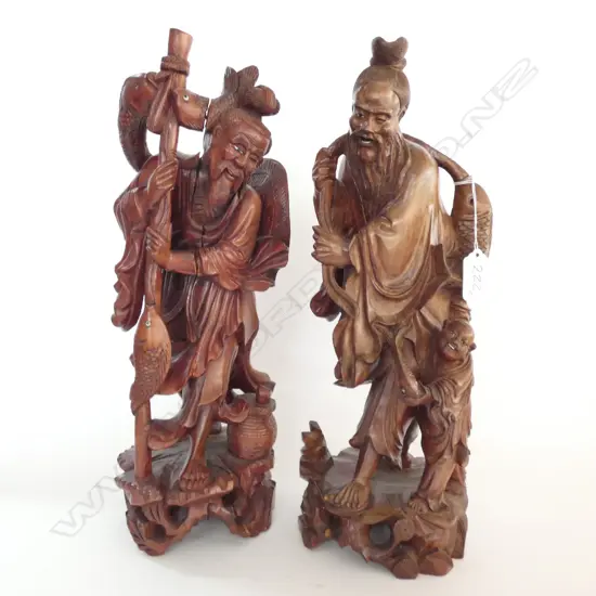 A PAIR OF WELL CARVED CHINESE HARDWOOD FIGURES H 360 MM