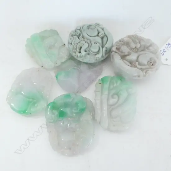 7 JADEITE PENDANTS/HANDLING PCES.