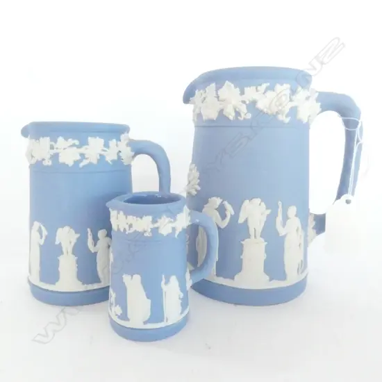 TRIO OF WEDGWOOD BLUE JASPERWARE GRADUATED JUGS, H. 130, 97, 62MM