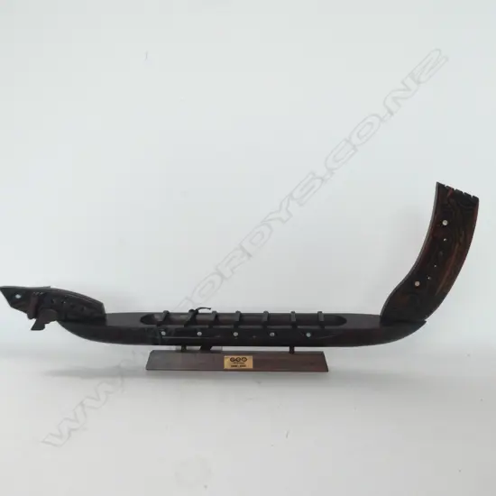 CARVED WOODEN MAORI WAKA ON STAND, L. 560MM