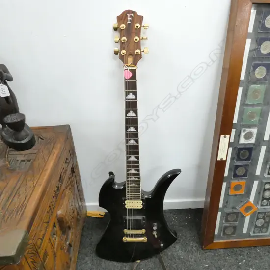 VINTAGE ELECTRIC GUITAR 'F'. BLACK BODY. MOP INLAY. FRET BOARD
