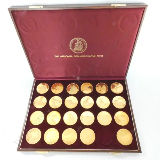23 SILVER GILT AFRICAN ANIMAL COINS 