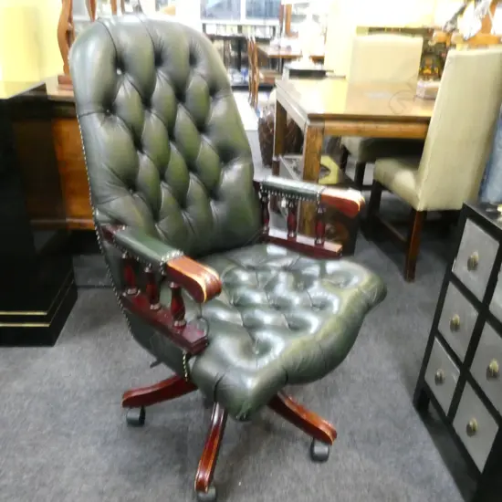 LEATHER UPHOLSTERED EXECUTIVE CHAIR SHOWING WEAR