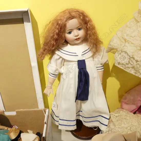 PORCELAIN FACED DOLL