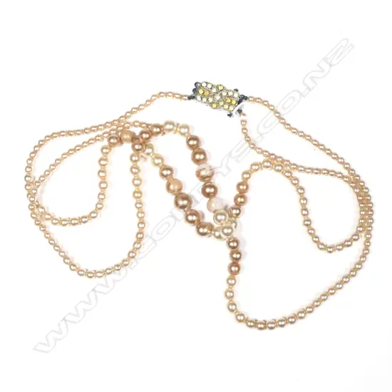 Double string Simulated Pearls, requires repair. Some wear on coating on pearls