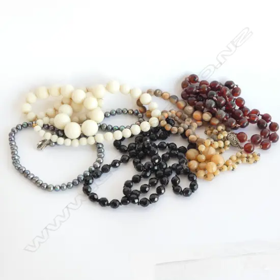 SIX ASSORTED BEADED NECKLACES