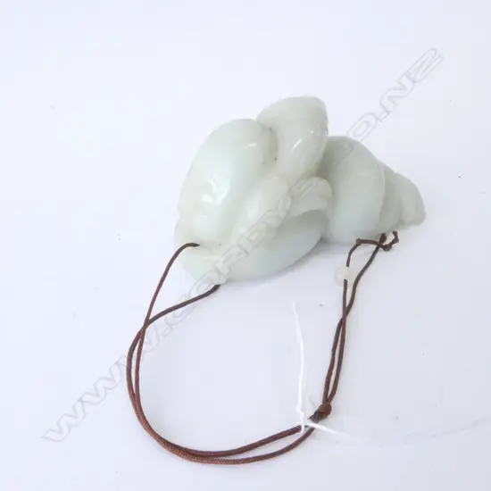 JADE BUDDHA  HANDLING STONE, L. 75MM