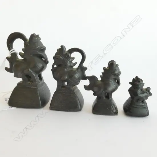 FOUR GRADUATED FOO DOGS OR DRAGON WEIGHTS, H.67MM