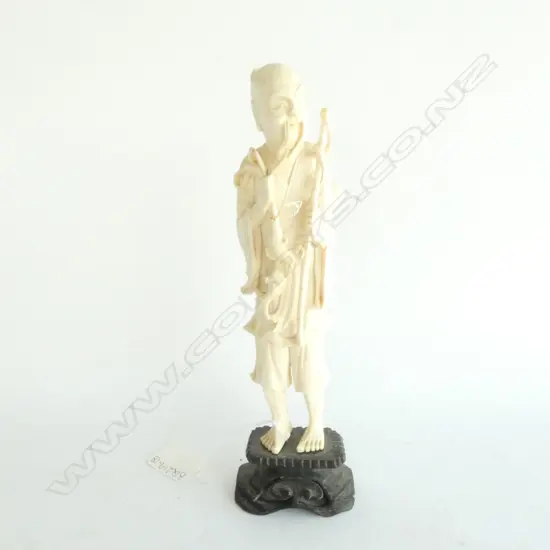 CARVED IVORY FISHERMAN ON WOOD STAND (faulted) H.220mm